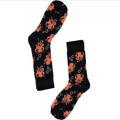 Desert Bloom: Whimsical Cactus Cartoon Socks - Black orange octopus