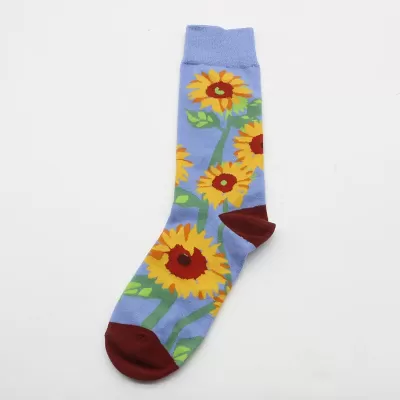 Desert Bloom: Whimsical Cactus Cartoon Socks - Light blue sunflowers design