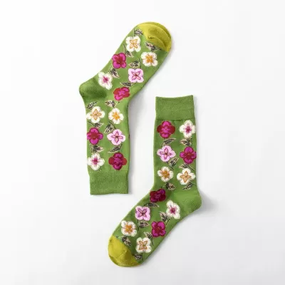 Desert Bloom: Whimsical Cactus Cartoon Socks - Green white pink flowers